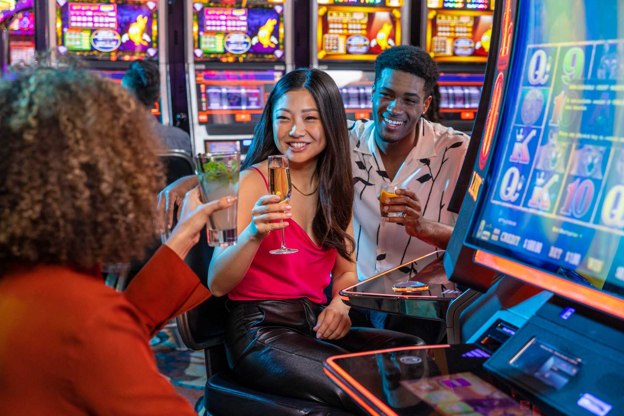 Friends enjoy a drink at the slots at Jamul Casino Resort