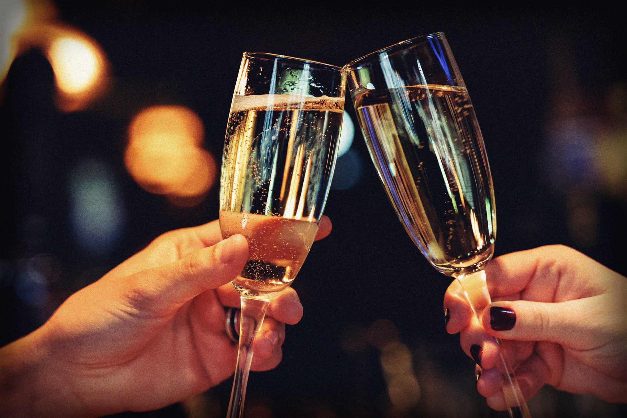 Couple toasting champagne glasses